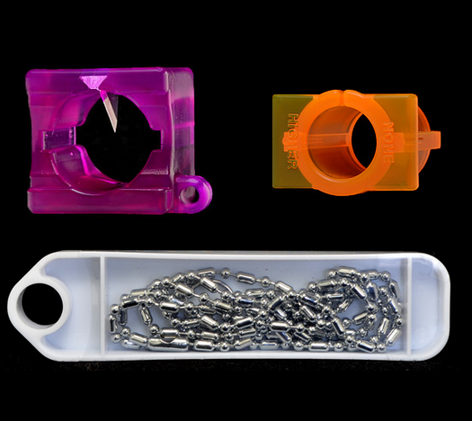 A set of three different plastic objects.