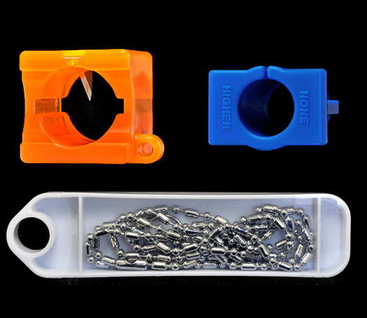 A close up of some plastic clips and chains